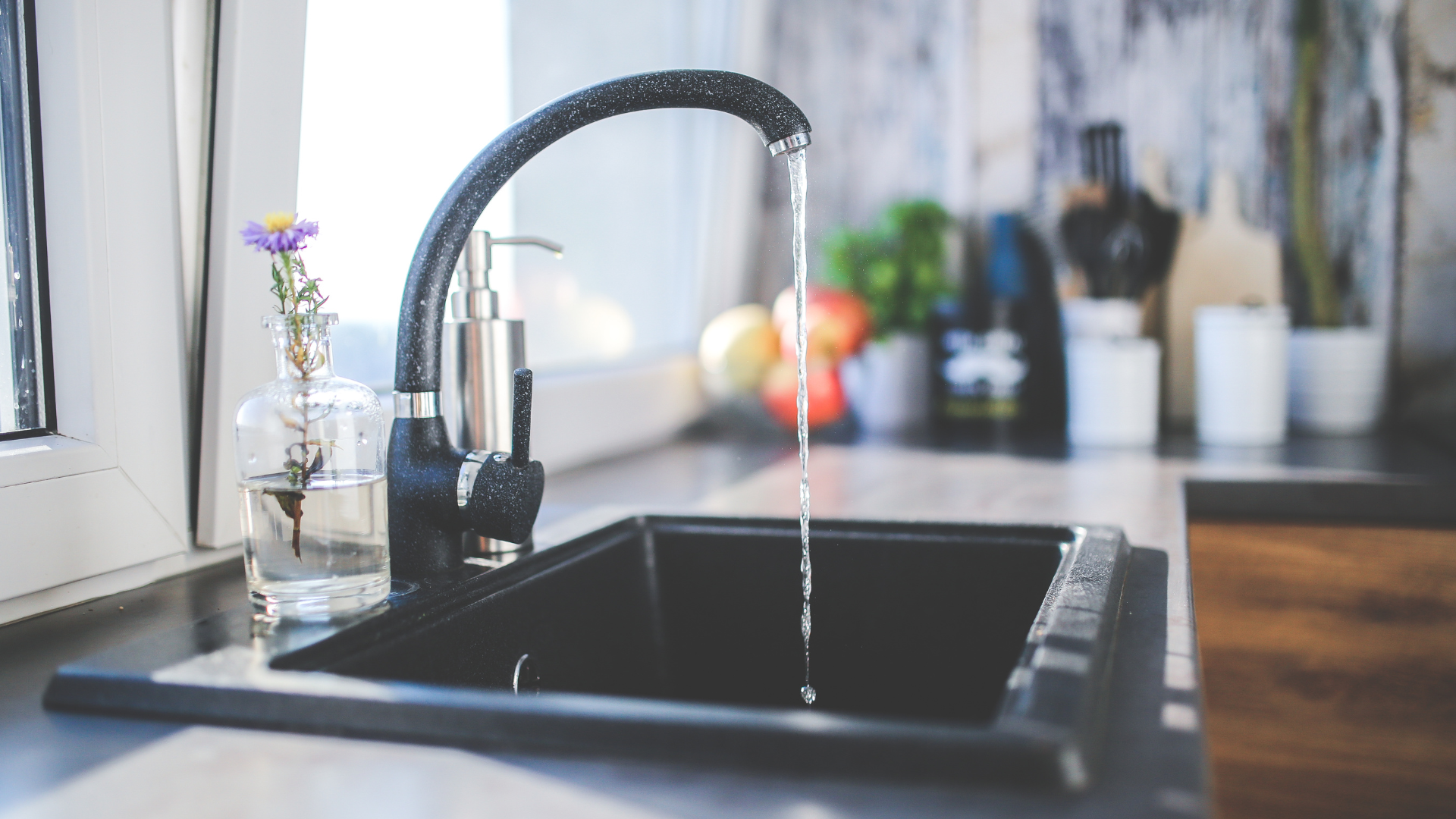 sink-faucet-with-water-coming-out